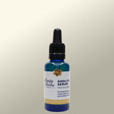 Bottle of Purity Herbs Andlits Serum on a light  background