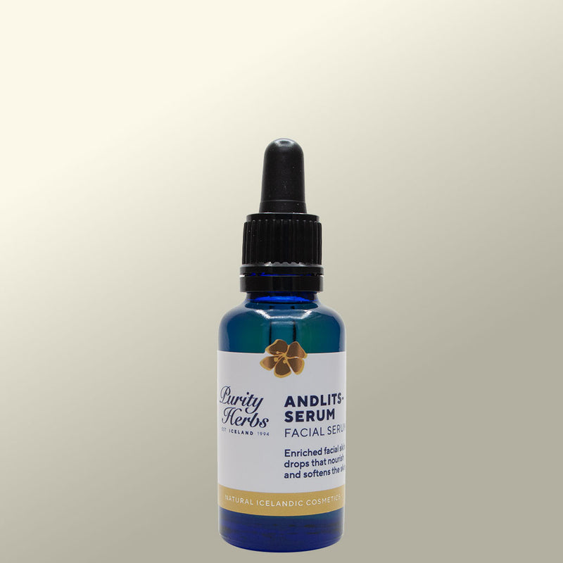 Bottle of Purity Herbs Andlits Serum on a light  background