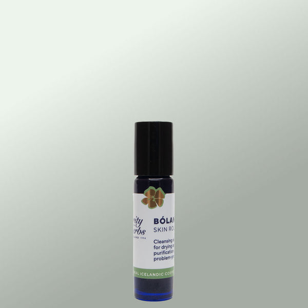 Roll-on bottle with black cap and white label on a gray background