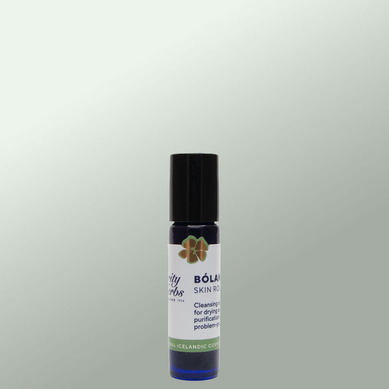 Roll-on bottle with black cap and white label on a gray background