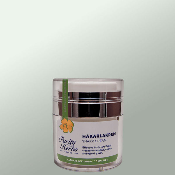 Jar of Hákarlakrem Shark Cream with a green label on a light grey background