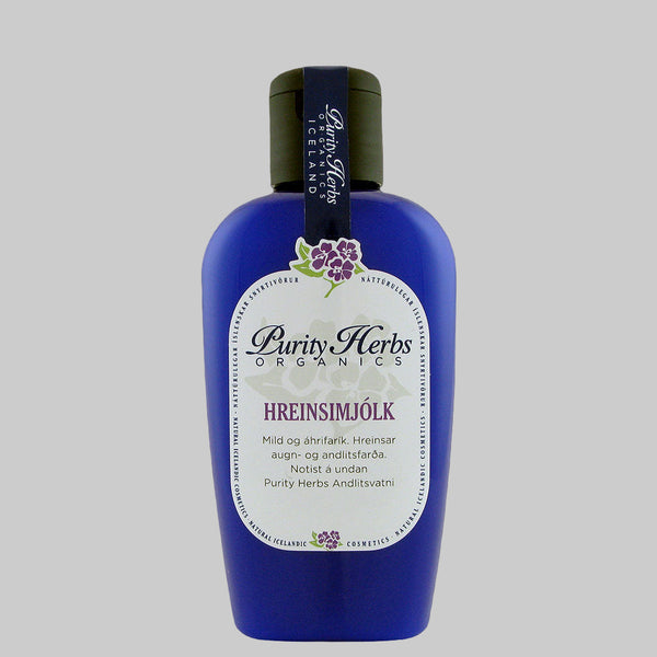 Blue bottle of Purity Herbs Organics on a light  background