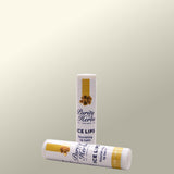 Two Purity Herbs Ice Lips lip balm sticks with on a light gray background