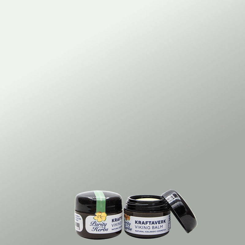 Two Jars, one open of Kraftaverk - Viking Balm on a light grey background