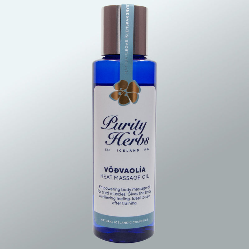 Bottle of Purity Herbs Heat massage oil on a light gray background